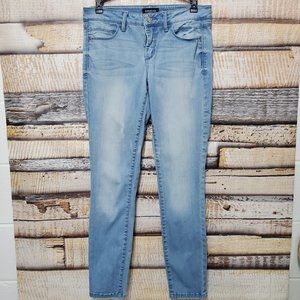 Bebe Distressed Skinny Jeans